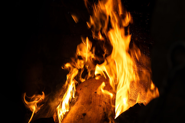 Log in flames by EB. Photography