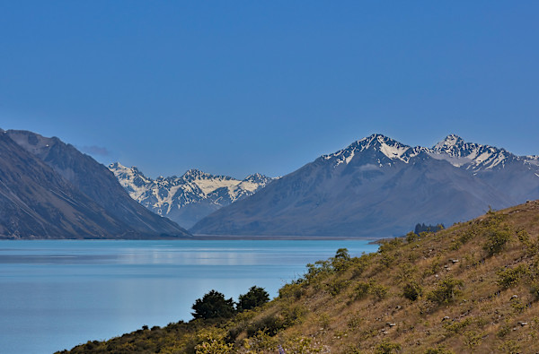 Alpine peaks and tranquil waters by EB. Photography