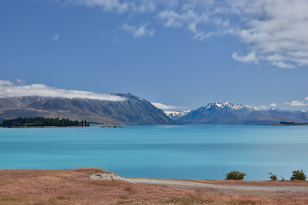 Mountains reflecting in crystal water by EB Photography