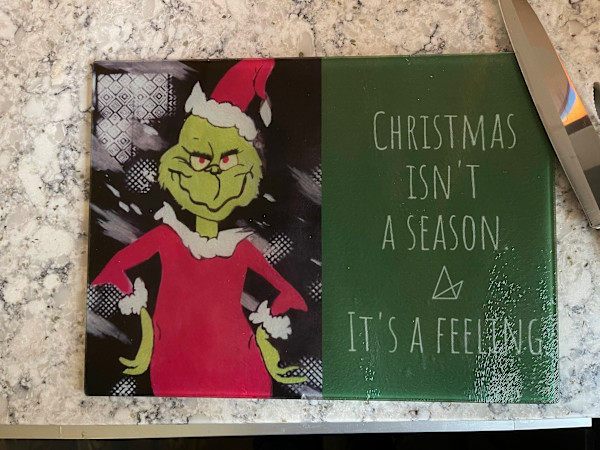Christmas Grinch Glass Cutting Board #2 by Aaron Adkins