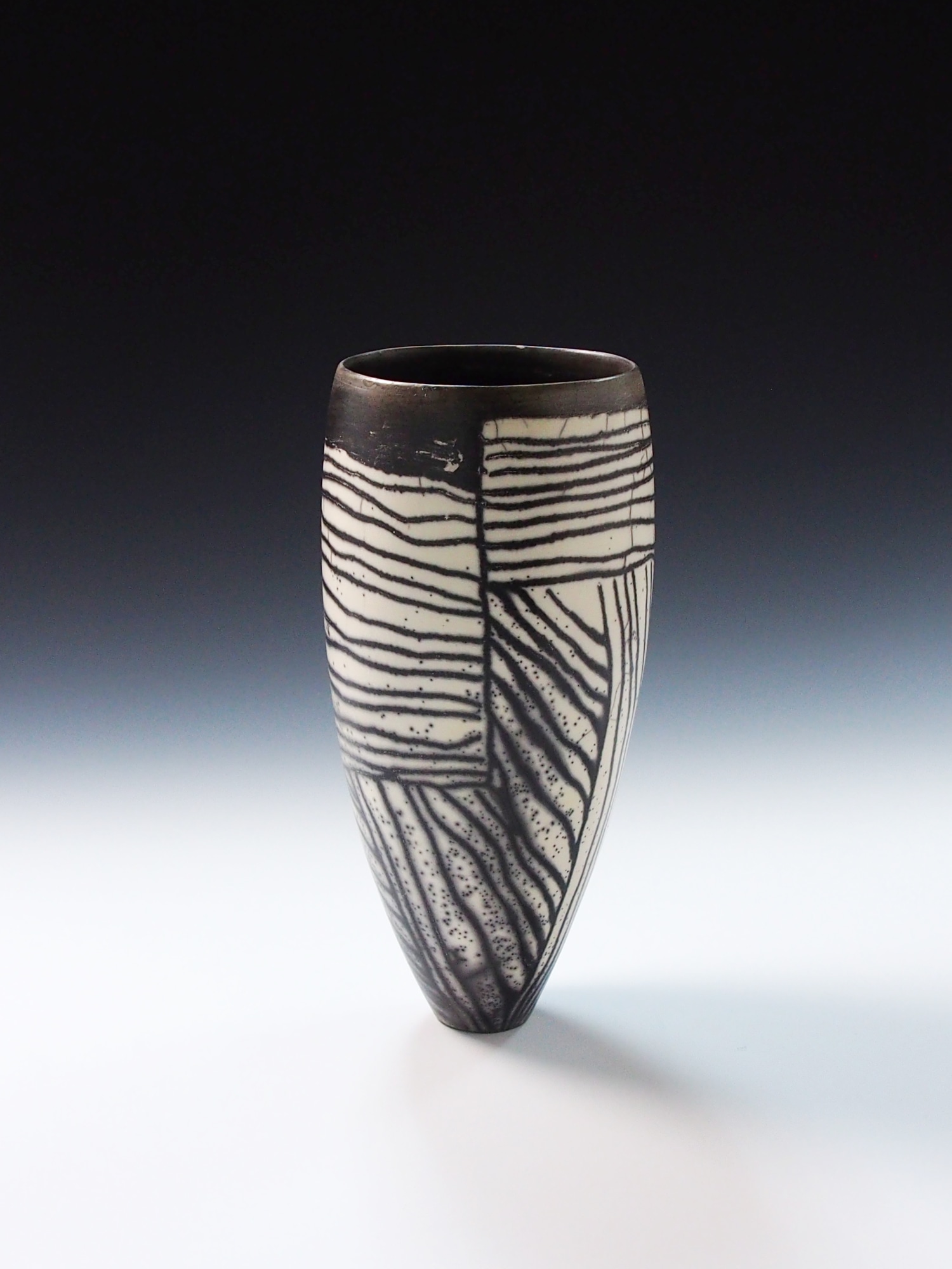 Black and on sale white vessel. Naked RAKU sculpture.