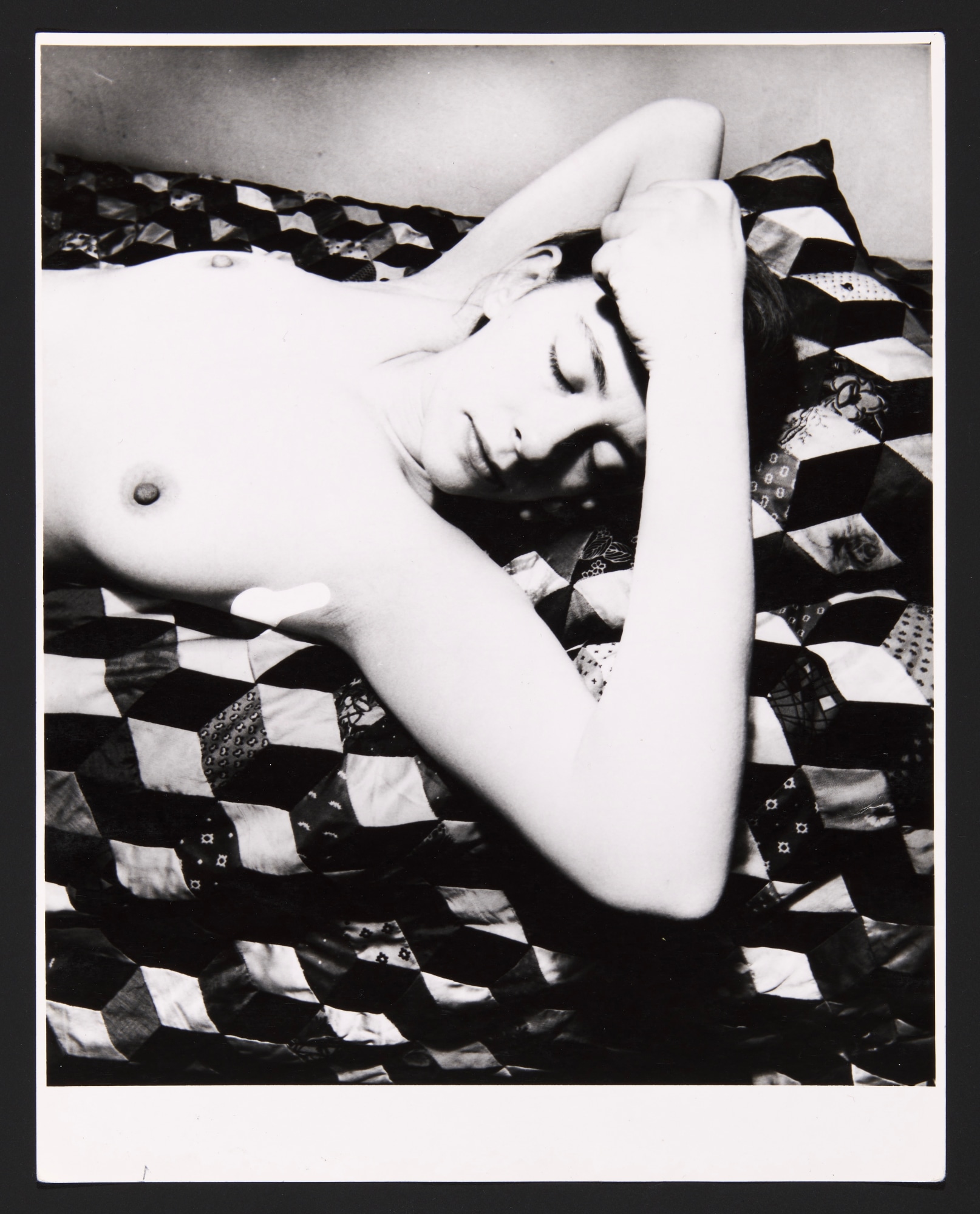 Black and white photograph of a sleeping nude female torso from the  collection of Berman Museum of Art | Artwork Archive