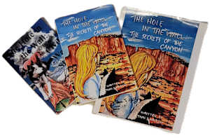 Two of the three books in my series