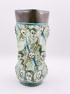 Untitled (vase with skull and portraits)