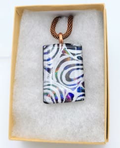Necklace with White Swirl Pattern on Dichroic
