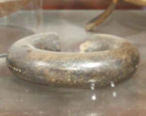 Manilla currency bracelet