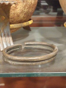 Manilla currency bracelet