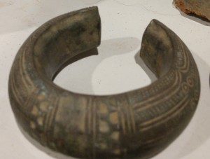 Manilla currency bracelet