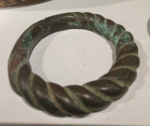 Manilla currency bracelet