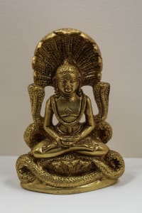 Buddha statue with Mucalinda
