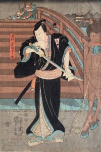 Man stands, holds sword, bites a book