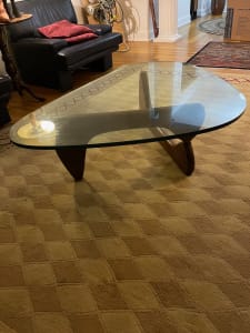 Herman Miller Noguchi coffee table with brow natural wood