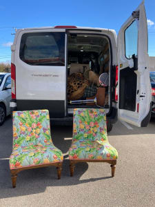 Pair of low upholstered floral print chairs