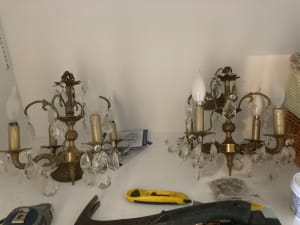 Pair of brass chandeliers