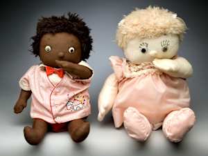 Doll (thumbsucking black baby)