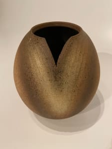 Globular ceramic ikebana vase