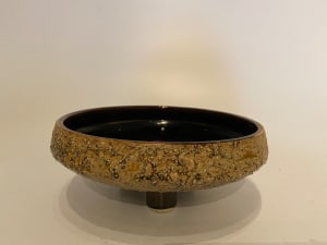 Shallow ceramic ikebana vase on three feet