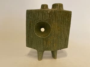 Green ceramic ikebana vase with round cutout