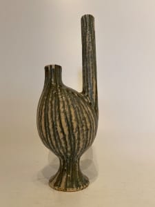 Stemmed globular ceramic ikebana vase with asymmetrical spouts