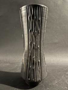 Ceramic ikebana vase on a foot