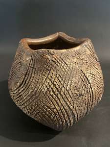 Globular ceramic ikebana vase