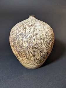 Globular ceramic ikebana vase