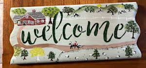 The Cows Are Grazing Near The Hill