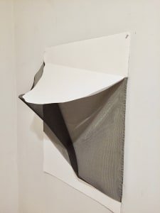 The space behind the paper (white)