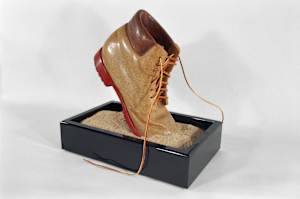 STONE CARVED BOOT ONWARD AND FORWARD