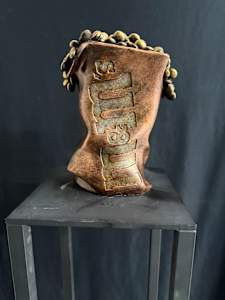 Gold M&M Bag, reproduction of a stone carving