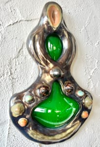 Emerald glass relic