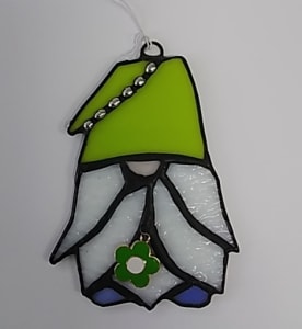 gnome with lime hat and green flower