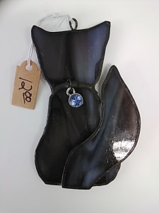black, blue, and grey kitten with blue gem