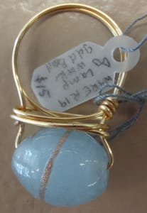 Oval Sky Blue & gold lampwork bead on gold