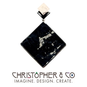 CMJ B 13137    Gold pendant set with slate & pyrite square cabachon designed by Christopher M. Jupp