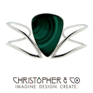 CMJ B 13141    Sterling silver bracelet set with Malochite designed by Christopher M. Jupp