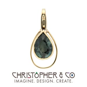 CMJ F 13022    Gold element set with spinel designed by Christopher M. Jupp.