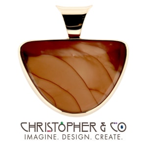 CMJ F 13162    Gold pendant set with Bruneau jasper designed by Christopher M. Jupp.