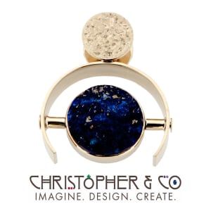 CMJ F 13164    Gold pendant set with lapis lazuli designed by Christopher M. Jupp.
