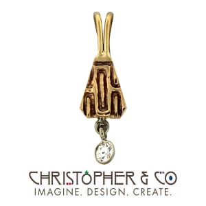 CMJ G 13036    Gold pendant set with diamond designed by Christopher M. Jupp.