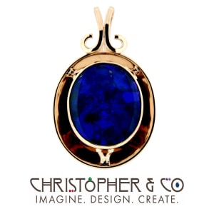 CMJ H 13126    Gold pendant set with opal in front of concave mirror designed by Christopher M. Jupp.