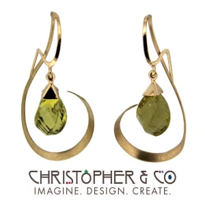 CMJ J 13002    Gold earring pair set with Oro Verde quartz hand faceted by Richard Homer and designed by Christopher M. Jupp.