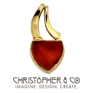 CMJ J 13040    Gold pendant set with fire opal designed by Christopher M. Jupp.
