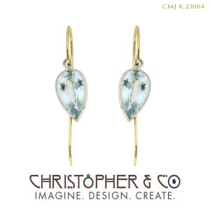 CMJ K 23004  Gold earrings by Christopher M. Jupp set with aquamarine.