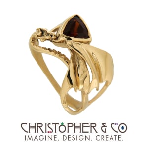 CMJ M 21095 & 21096 Two 14 karat gold rings set with garnets designed by Christopher M. Jupp