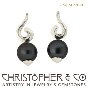 CMJ M 22024  White gold earrings designed by Christopher M. Jupp set with pearls.