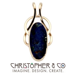 CMJ N 13157    Gold pendant set with lapis lazuli designed by Christopher M. Jupp.