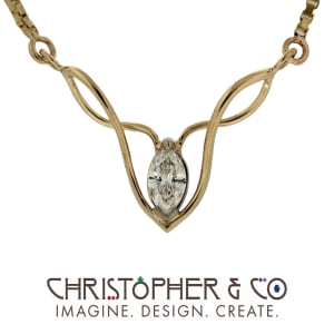 CMJ P 21087   Gold Necklace set with marquis cut diamond designed by Christopher M. Jupp.