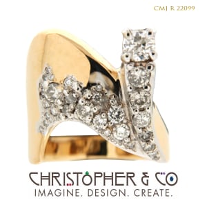CMJ R 22099 Yellow and white gold ring designed by Christopher M. Jupp set with diamonds.