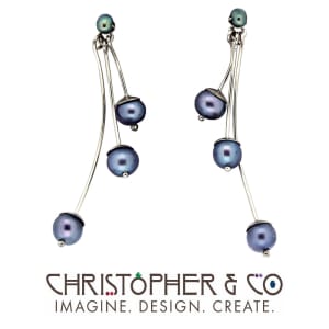 CMJ S 13171    Gold earring pair set with lavendar freshwater pearls designed by Christopher M. Jupp.